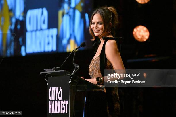 Chrissy Teigen speaks onstage as City Harvest Presents The 2024 Gala: Magic Of Motown at Cipriani 42nd Street on April 10, 2024 in New York City.