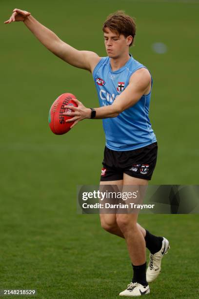 Mattaes Phillipou of the Saints kicks the ball during a St Kilda Saints AFL training session at RSEA Park on April 11, 2024 in Melbourne, Australia.