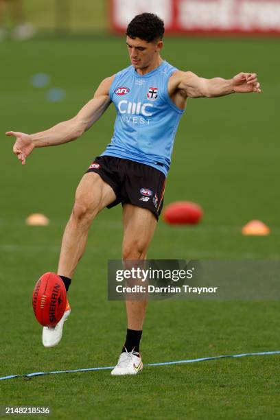 Anthony Caminiti of the Saints kicks the ball during a St Kilda Saints AFL training session at RSEA Park on April 11, 2024 in Melbourne, Australia.