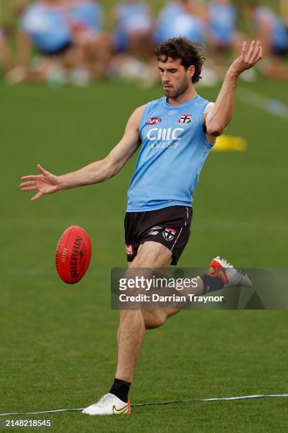 Max King of the Saints kicks the ball during a St Kilda Saints AFL training session at RSEA Park on April 11, 2024 in Melbourne, Australia.