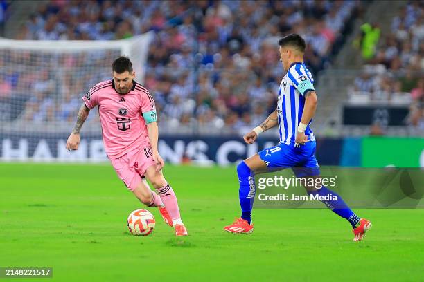 Lionel Messi of Inter Miami fights for the ball with Maximiliano Meza of Monterrey during CONCACAF Champions Cup 2024 Quarterfinals second leg...