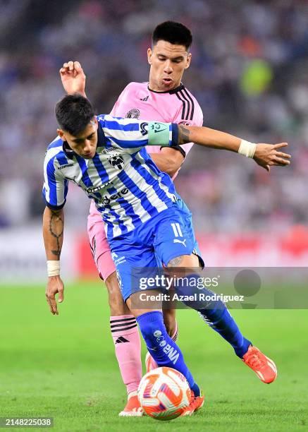 Maximiliano Meza of Monterrey controls the ball while defended by Diego Gómez of Inter Miami in the second half during the CONCACAF Champions Cup...