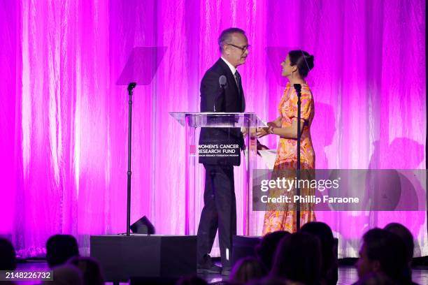 Tom Hanks and Dr. Evanthia Roussos Torres speak onstage during "An Unforgettable Evening" Benefiting The Women's Cancer Research Fund at Beverly...