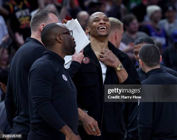 Russell Westbrook of the LA Clippers laughs on the sidelines during a 124-108 loss to the Phoenix Suns at Crypto.com Arena on April 10, 2024 in Los...