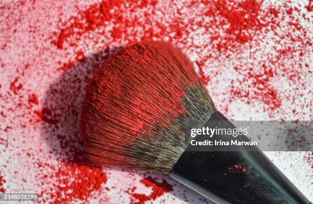 make-up brush stained with red powder blush - make up brush stock pictures, royalty-free photos & images