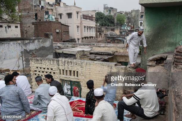 Muslims prepare to perform Eid Al-Fitr prayers at the Hazrat Nizamuddin Dargah on April 11, 2024 in Delhi, India. Muslims worldwide observe the Eid...