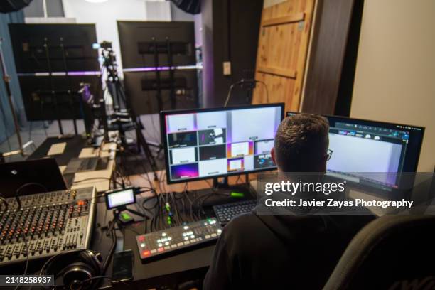 tv editor working in television studio - editing equipment stock pictures, royalty-free photos & images