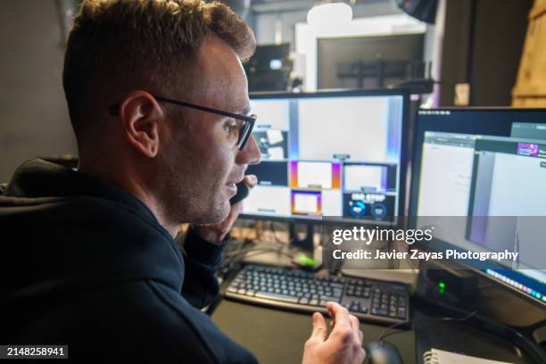 tv editor working in television studio - film editor stock pictures, royalty-free photos & images