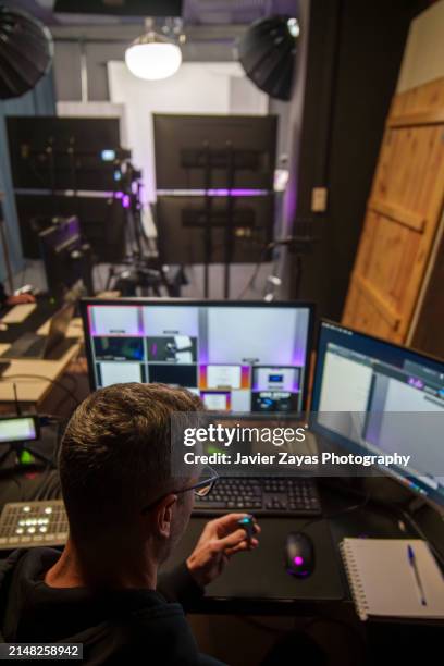 tv editor working in television studio - film editor stock pictures, royalty-free photos & images