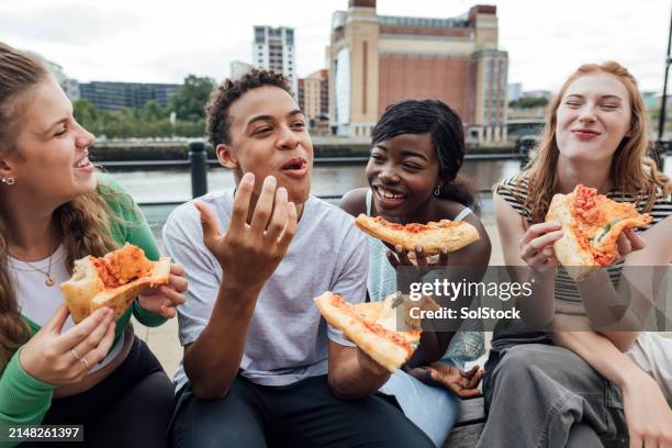 telling a joke with friends - teenager stock pictures, royalty-free photos & images
