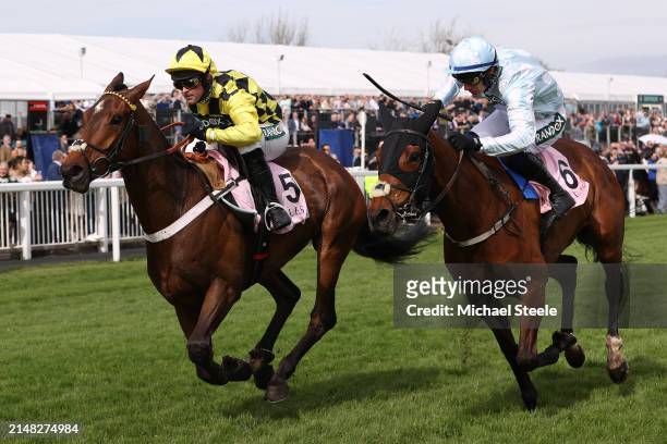 Nico de Boinville riding Sir Gino to victory from Paul Townend riding Kargese in the Boodles Anniversary juvenile hurdle race during the Opening Day...