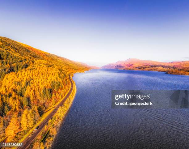 loch lomond in october sunshine - central stock pictures, royalty-free photos & images