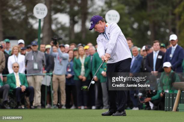 Tom Watson of The United States plays his tee shot in the Honorary Starters ceremony during the first round of the 2024 Masters Tournament at Augusta...