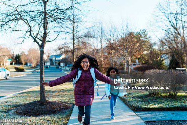 cute girls run down neighborhood sidewalk - indian truck stock pictures, royalty-free photos & images