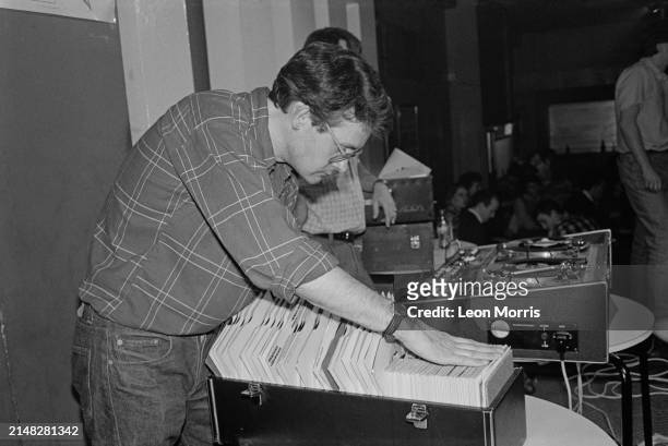Dj at work during a Northern Soul All-Nighter at the 100 Club, London, UK, circa 1985.