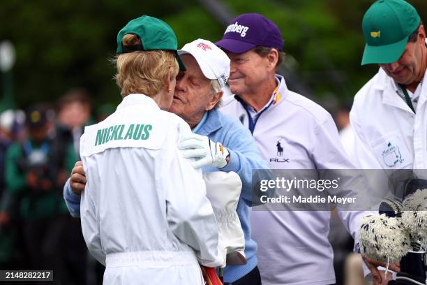 Jack Nicklaus of the United States and Barbara Nicklaus embrace following the first tee ceremony prior to the first round of the 2024 Masters...