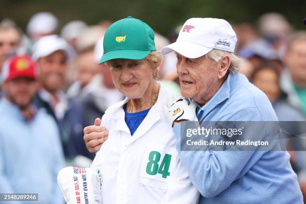 Jack Nicklaus of the United States and Barbara Nicklaus embrace following the first tee ceremony prior to the first round of the 2024 Masters...