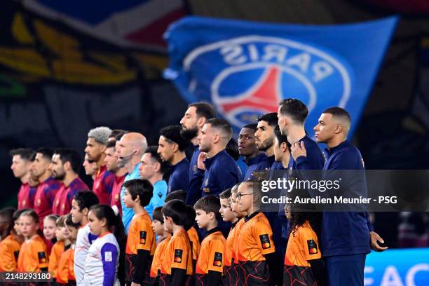 Paris Saint-Germain players line up before the UEFA Champions League quarter-final first leg match between Paris Saint-Germain and FC Barcelona at...