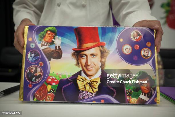 Close-up of an oversized chocolate bar in a wrapper depicting characters from the film 'Willie Wonka and the Chocolate Factory' during the Chocolate...