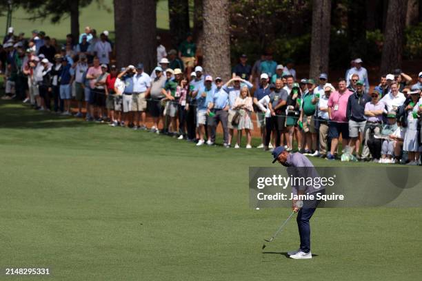 Tony Finau of the United States plays a shot on the second hole during the first round of the 2024 Masters Tournament at Augusta National Golf Club...