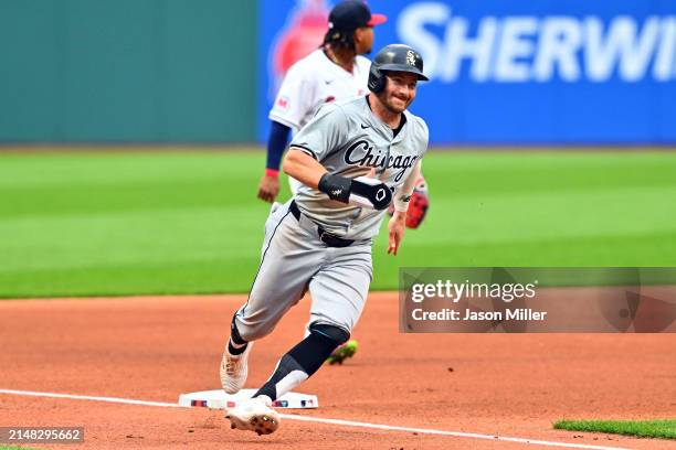 Robbie Grossman of the Chicago White Sox rounds third on his way to score during the first inning against the Cleveland Guardians at Progressive...