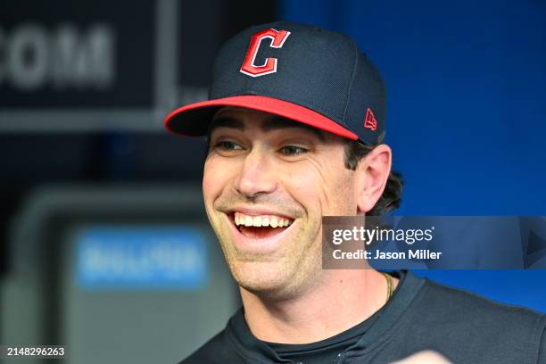 Pitcher Shane Bieber of the Cleveland Guardians talks with teammates prior to the game against the Chicago White Sox at Progressive Field on April...