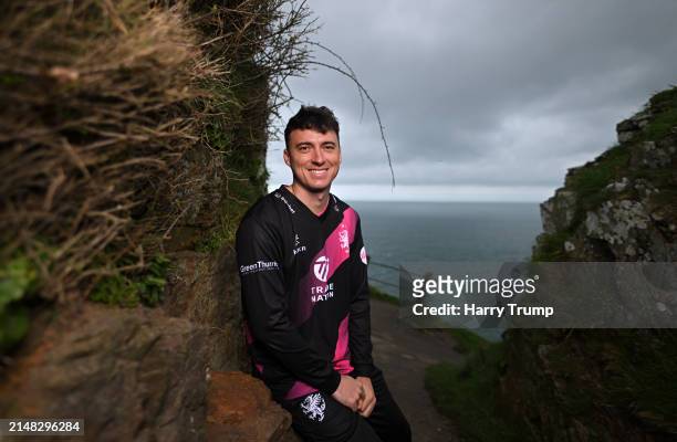 Tom Banton of Somerset poses for a photo at Valley of the Rocks on April 03, 2024 in Lynton and Lynmouth, England.