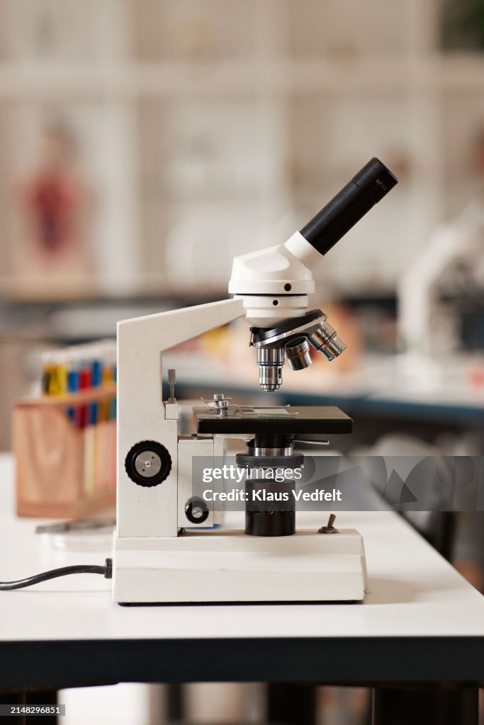 Microscope Desk Microscope On Desk In Science Laboratory High-Res Stock Photo - Getty ...