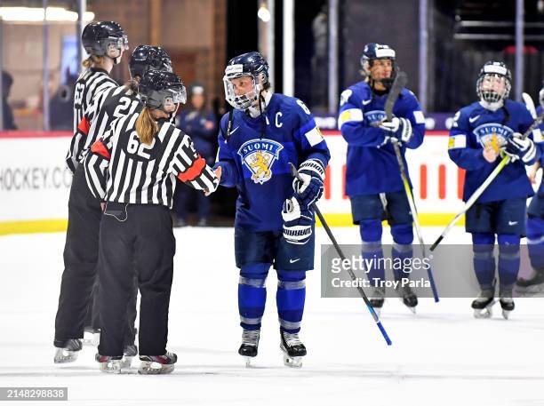 Jenni Hiirikoski of Finland shakes hands with the officials after Finland's win over Switzerland during the 2024 IIHF Women's World Championship at...