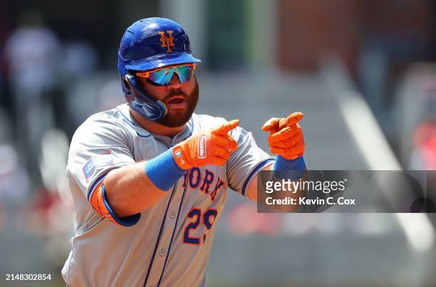 Stewart of the New York Mets reacts as he rounds third base after hitting a two-run homer in the third inning against the Atlanta Braves at Truist...