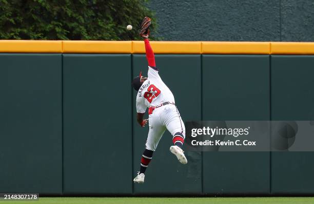Michael Harris II of the Atlanta Braves fails to catch this RBI double hit by Brandon Nimmo of the New York Mets in the third inning at Truist Park...