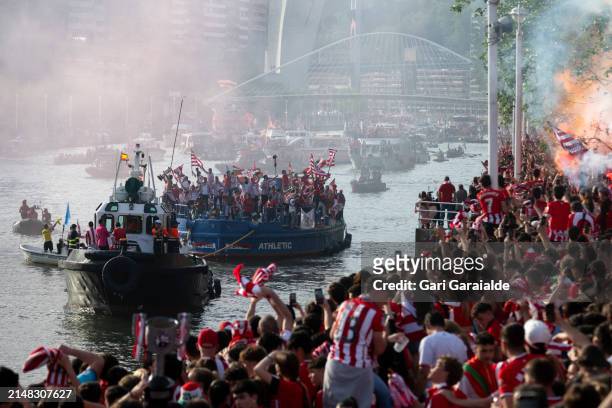Athletic Club players celebrate on board a river barge after winning the Spanish Copa del Rey cup Final against RCD Mallorca on April 11, 2024 in...