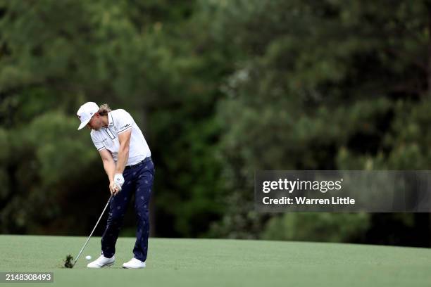 Cameron Smith of Australia plays a shot on the fifth hole during the first round of the 2024 Masters Tournament at Augusta National Golf Club on...