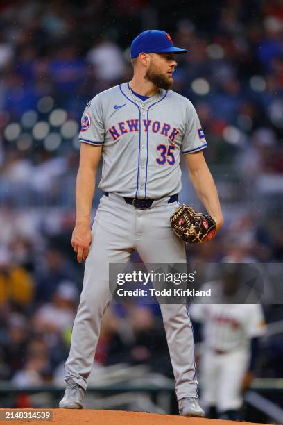 Adrian Houser of the New York Mets readies a pitch during the first inning against the Atlanta Braves at Truist Park on April 9, 2024 in Atlanta,...