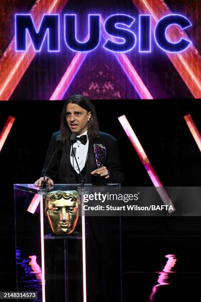 Borislav Slavov accepts the Music Award for 'Baldur's Gate 3' during the BAFTA Games Awards 2024 at the Queen Elizabeth Hall on April 11, 2024 in...