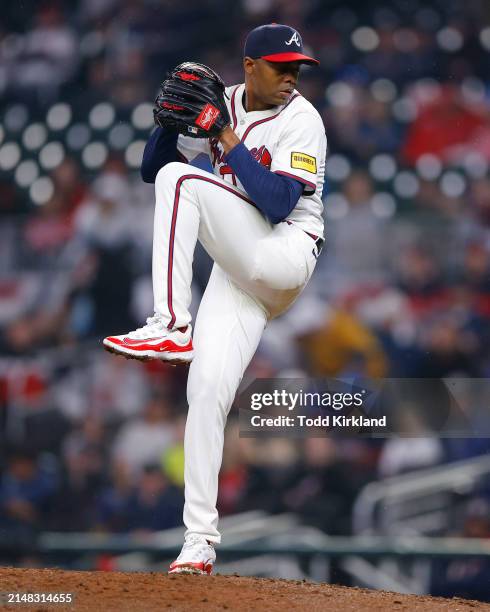 Raisel Iglesias of the Atlanta Braves pitches during the ninth inning against the New York Mets at Truist Park on April 9, 2024 in Atlanta, Georgia.
