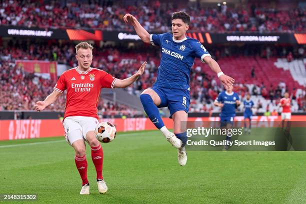 Leonardo Balerdi of Olympique de Marseille competes for the ball with Casper Tengstedt of SL Benfica during the UEFA Europa League 2023/24...