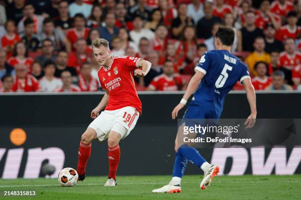Casper Tengstedt of SL Benfica, Leonardo Balerdi of Olympique Marseille battle for the ball during the UEFA Europa League 2023/24 Quarter-Final first...