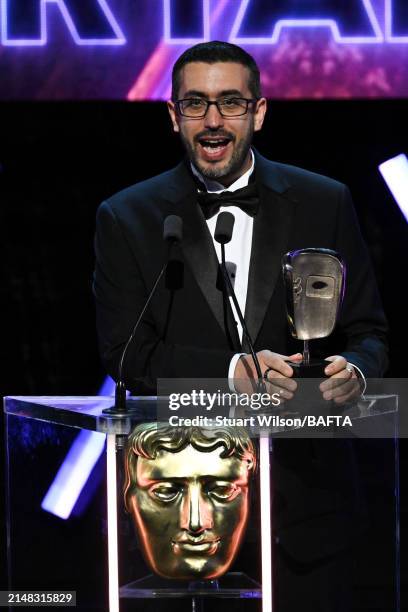 Zac Antonaci accepts the Game Beyond Entertainment Award on behalf of the Development Team for 'Tchia' during the BAFTA Games Awards 2024 at the...