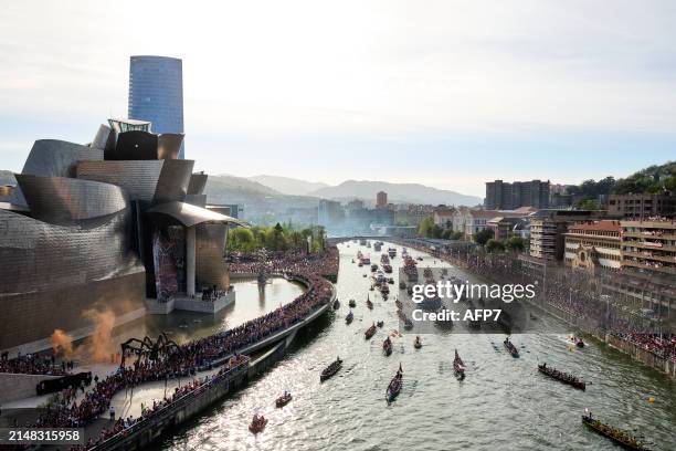 General view of the players of Athletic Club celebrating their Copa del Rey trophy winners title in the traditional trophy parade along the river...