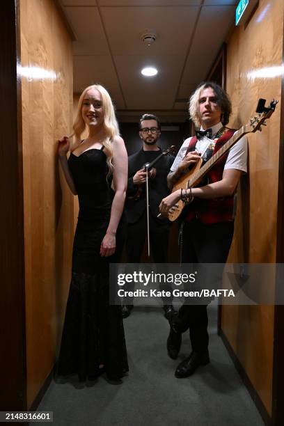 Julie Elven, Daniel Oates and Aaron Grimes backstage during the BAFTA Games Awards 2024 at the Queen Elizabeth Hall on April 11, 2024 in London,...