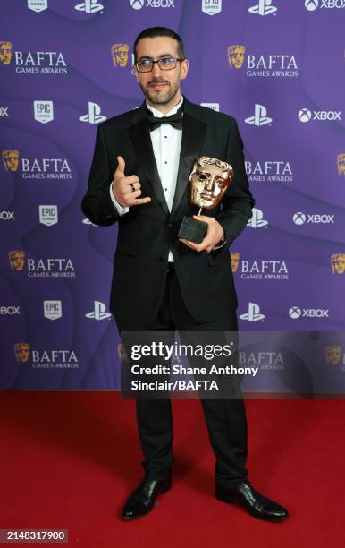 Zac Antonaci accepts the Game Beyond Entertainment Award on behalf of the Development Team for 'Tchia' during the BAFTA Games Awards 2024 at the...