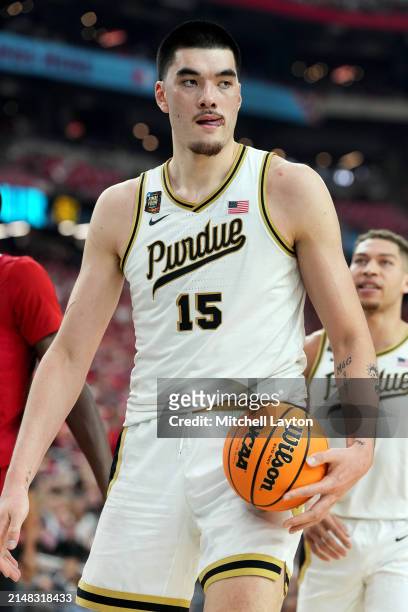 Zach Edey of the Purdue Boilermakers looks on during the NCAA Mens Basketball Tournament Final Four semifinal game against the North Carolina State...