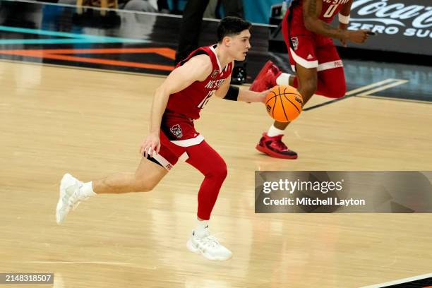 Michael O'Connell of the North Carolina State Wolfpack dribbles up court during the NCAA Mens Basketball Tournament Final Four semifinal game against...