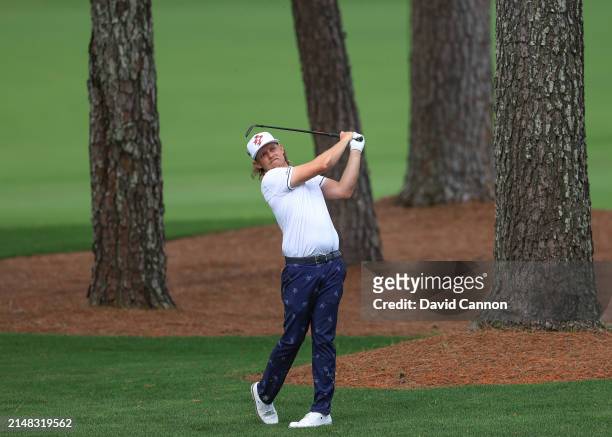 Cameron Smith of Australia plays his second shot on the seventh hole during the first round of the 2024 Masters Tournament at Augusta National Golf...