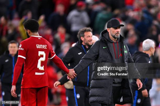 Jurgen Klopp, Manager of Liverpool, shakes hands with Joe Gomez of Liverpool at full-time following the team's defeat in the UEFA Europa League...