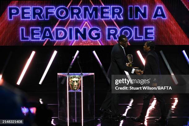 David Harewood presents Nadji Jeter with the Performer in a Leading Role Award for the portrayal of Miles Morales in 'Marvel's Spider-Man 2' during...