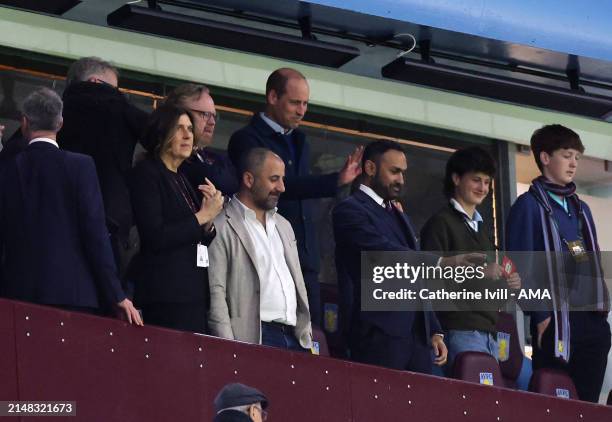 Prince William, Prince of Wales applauds as he watches from the stands during the UEFA Europa Conference League 2023/24 Quarter-final first leg match...