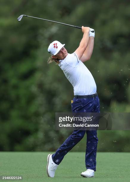 Cameron Smith of Australia plays his second shot on the fifth hole during the first round of the 2024 Masters Tournament at Augusta National Golf...