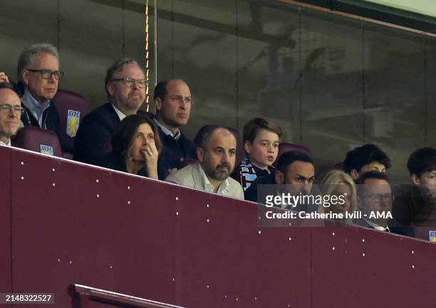 Prince William, Prince of Wales and Prince George of Wales watch from the stands during the UEFA Europa Conference League 2023/24 Quarter-final first...